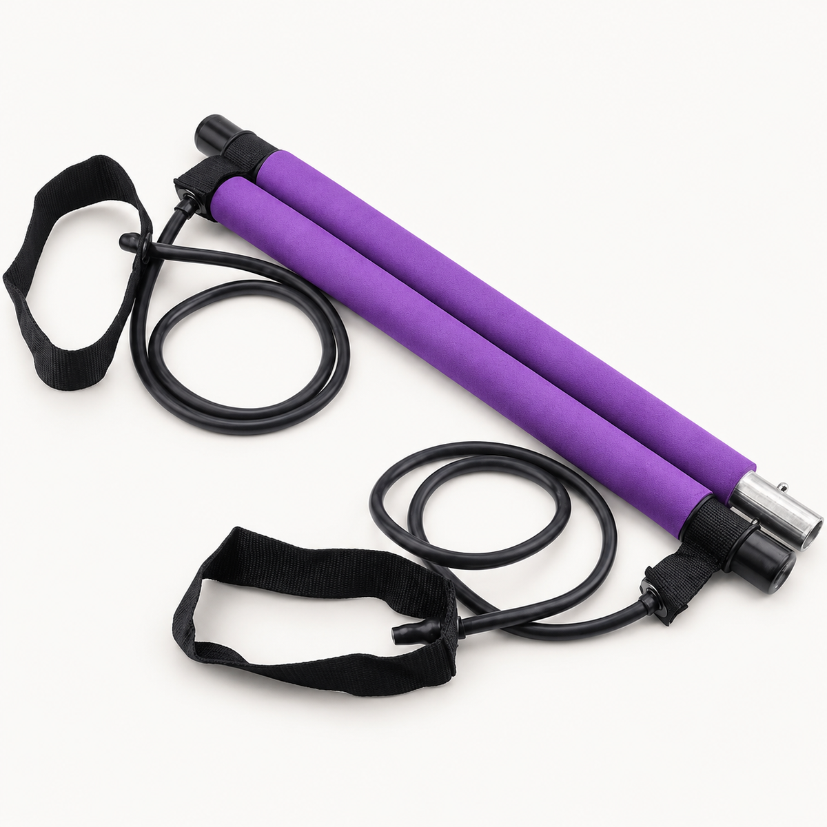 Opvouwbare paarse Pilates fitness stang met weerstandsbanden en voetlussen compact naast elkaar geplaatst.