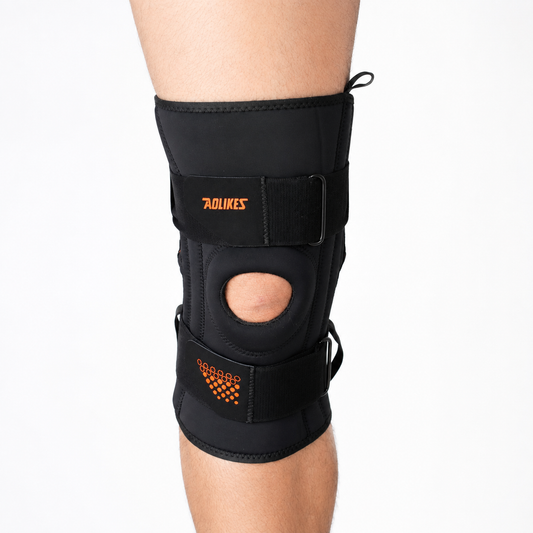 Kniebrace met sterke ondersteuning en extra stabiliteit gedragen rond de knie