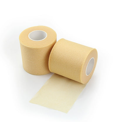 Huidkleurige underwrap rol van 7 cm breed en 27 meter lang voor gebruik onder sporttape