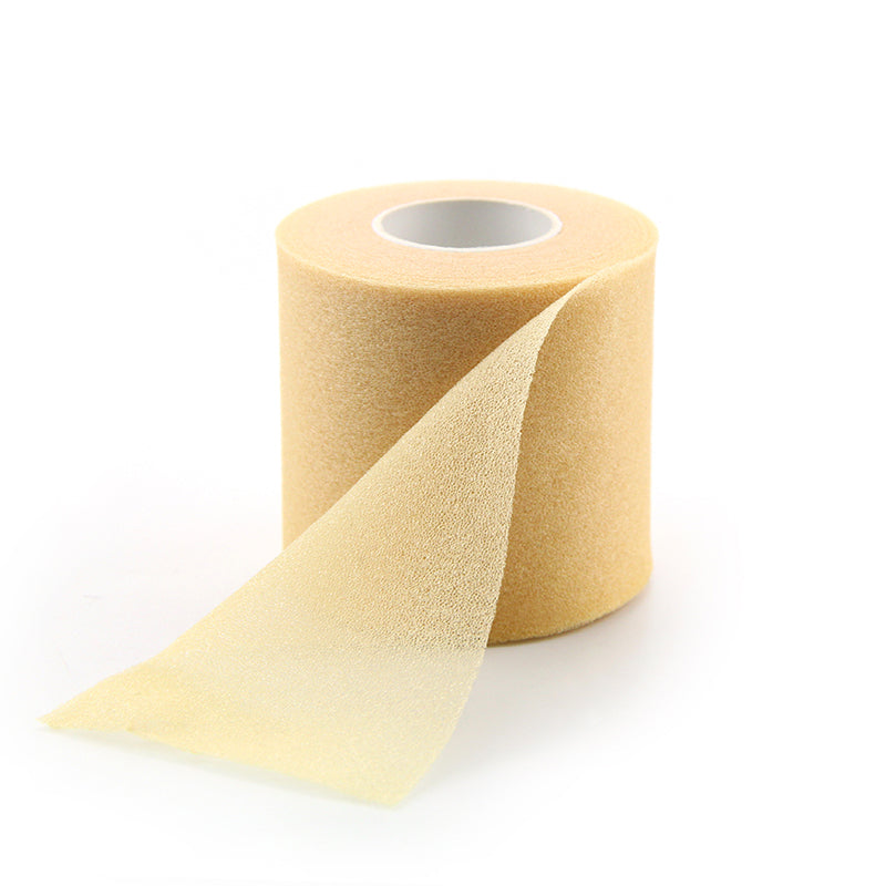 Huidkleurige underwrap gebruikt voor ondersteuning en comfort tijdens sportactiviteiten